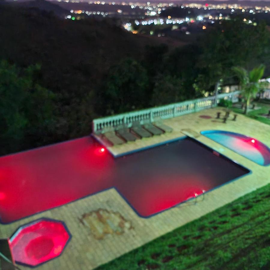 Pousada Nossa Senhora Penedo  Εξωτερικό φωτογραφία The swimming pool at the resort