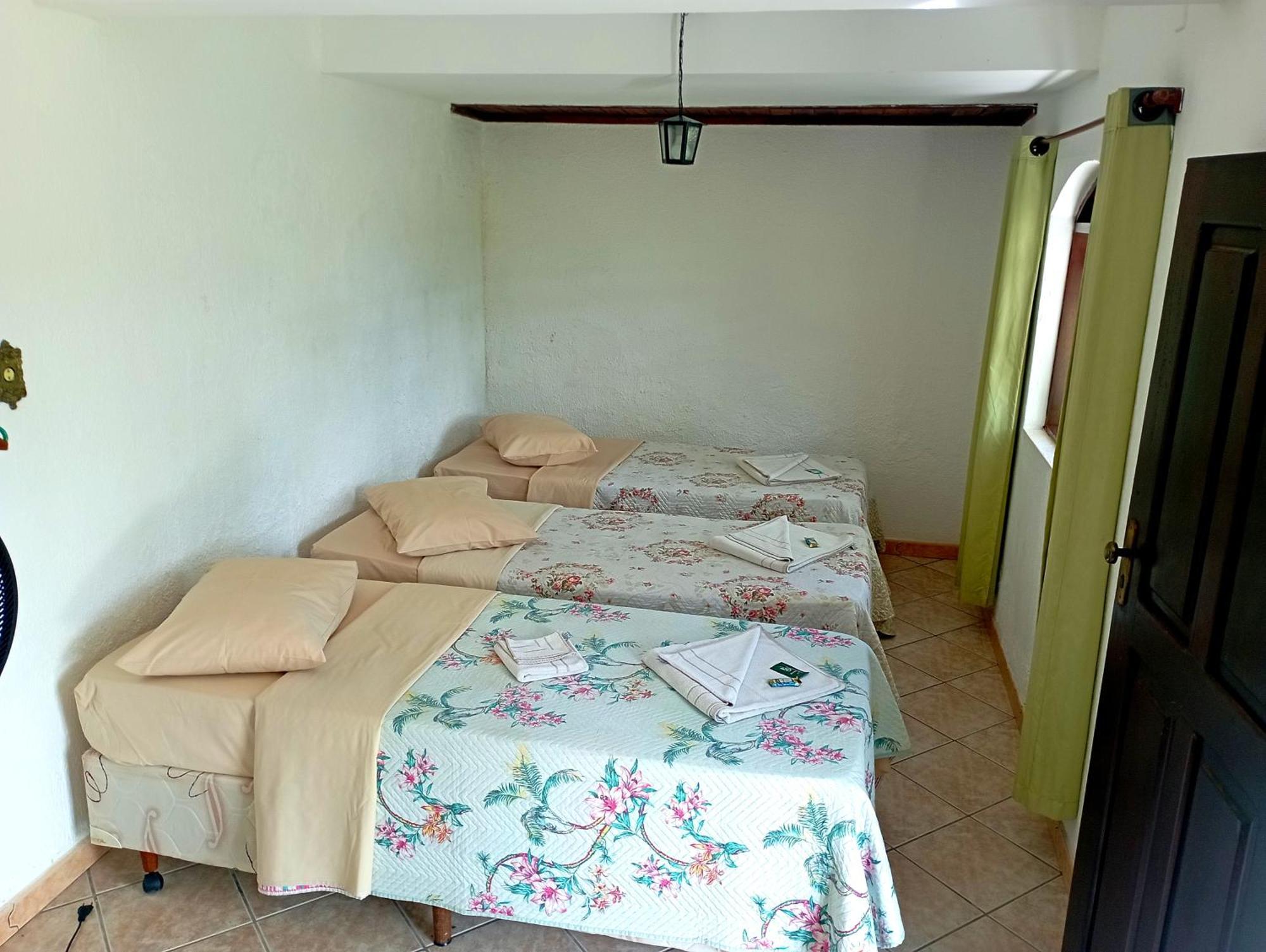 Pousada Nossa Senhora Penedo  Εξωτερικό φωτογραφία A bedroom in a hostel