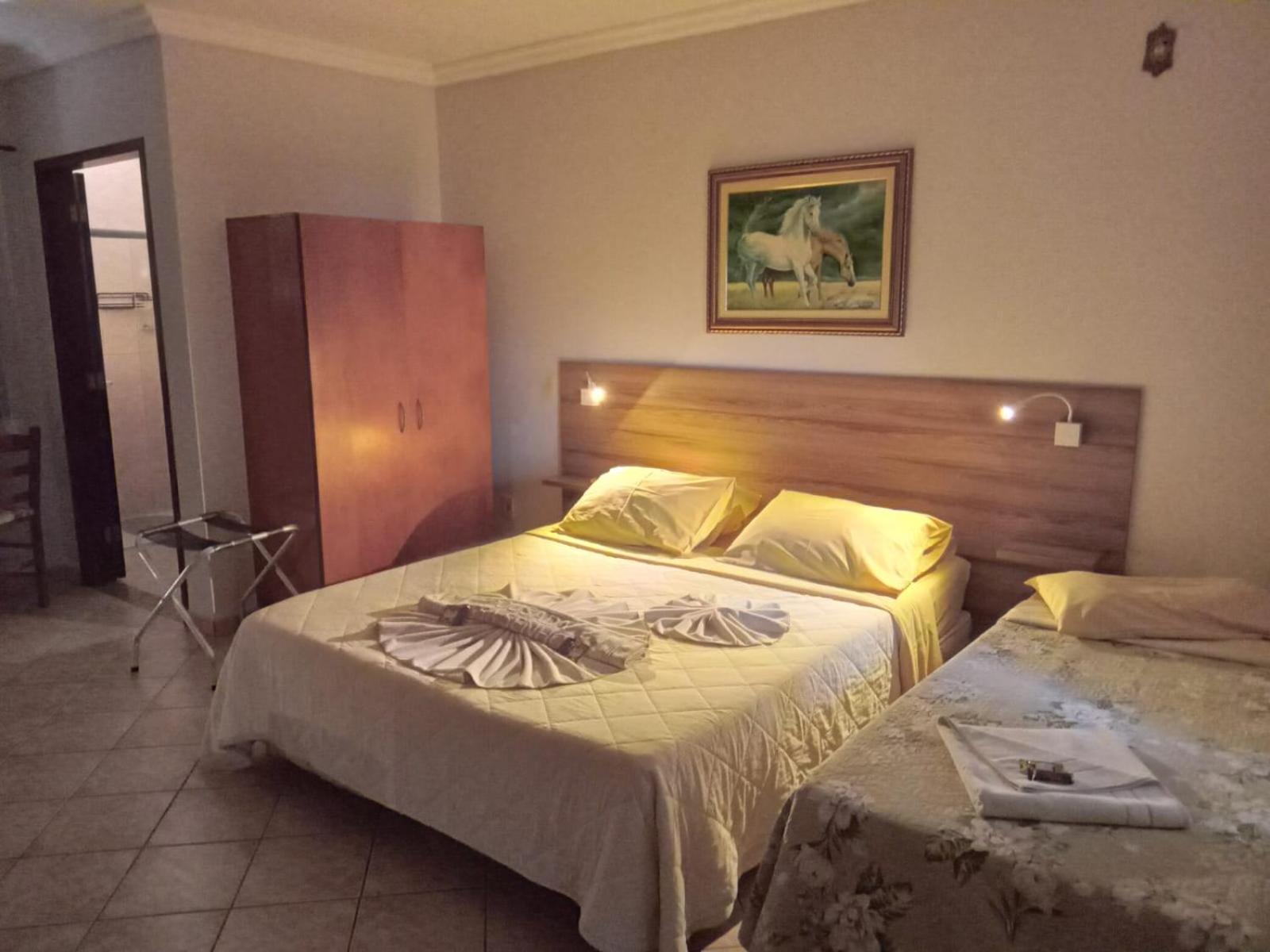 Pousada Nossa Senhora Penedo  Δωμάτιο φωτογραφία A bedroom in a hotel